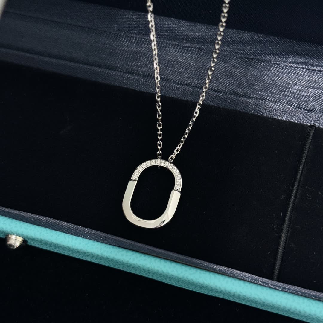 Tiffany & Co. Return to Tiffany Silver Ring Pendant Necklace